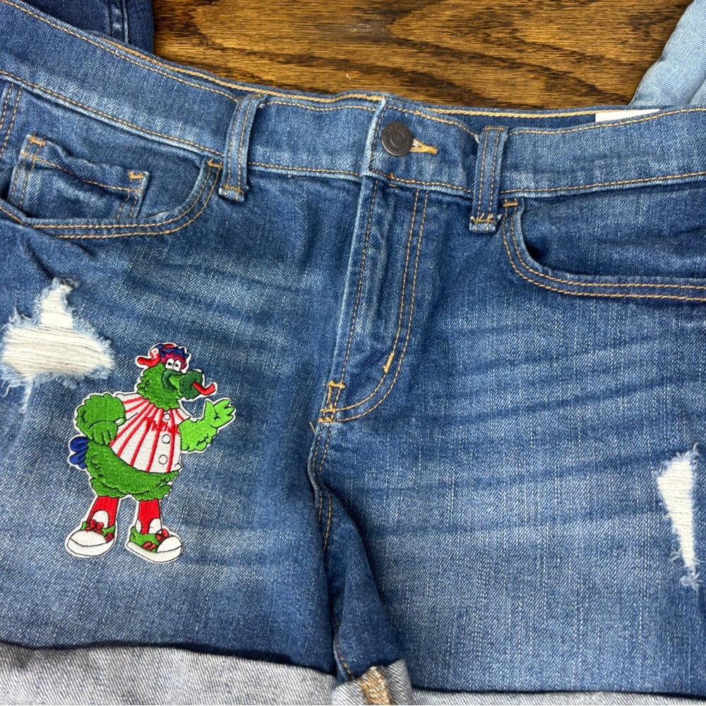 Blue Jean Shorts with Embroidered Patches and Distressed Details